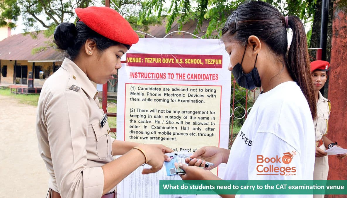 What do students need to carry to the CAT 2022 examination venue?